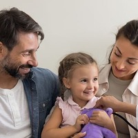 family of three at doctor's